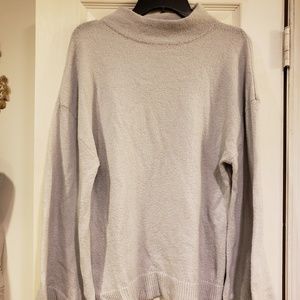 Light gray turtle neck sweater with bell sleeves